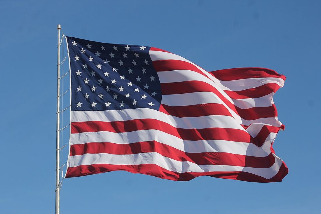 American Flag Waving on a Flag Pole